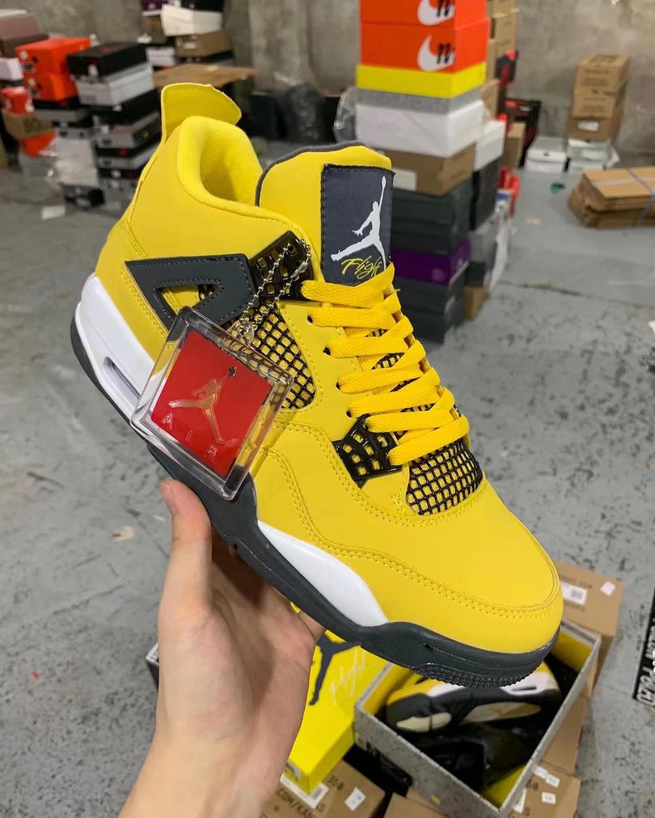 Air Jordan 4 Retro "Tour Yellow"